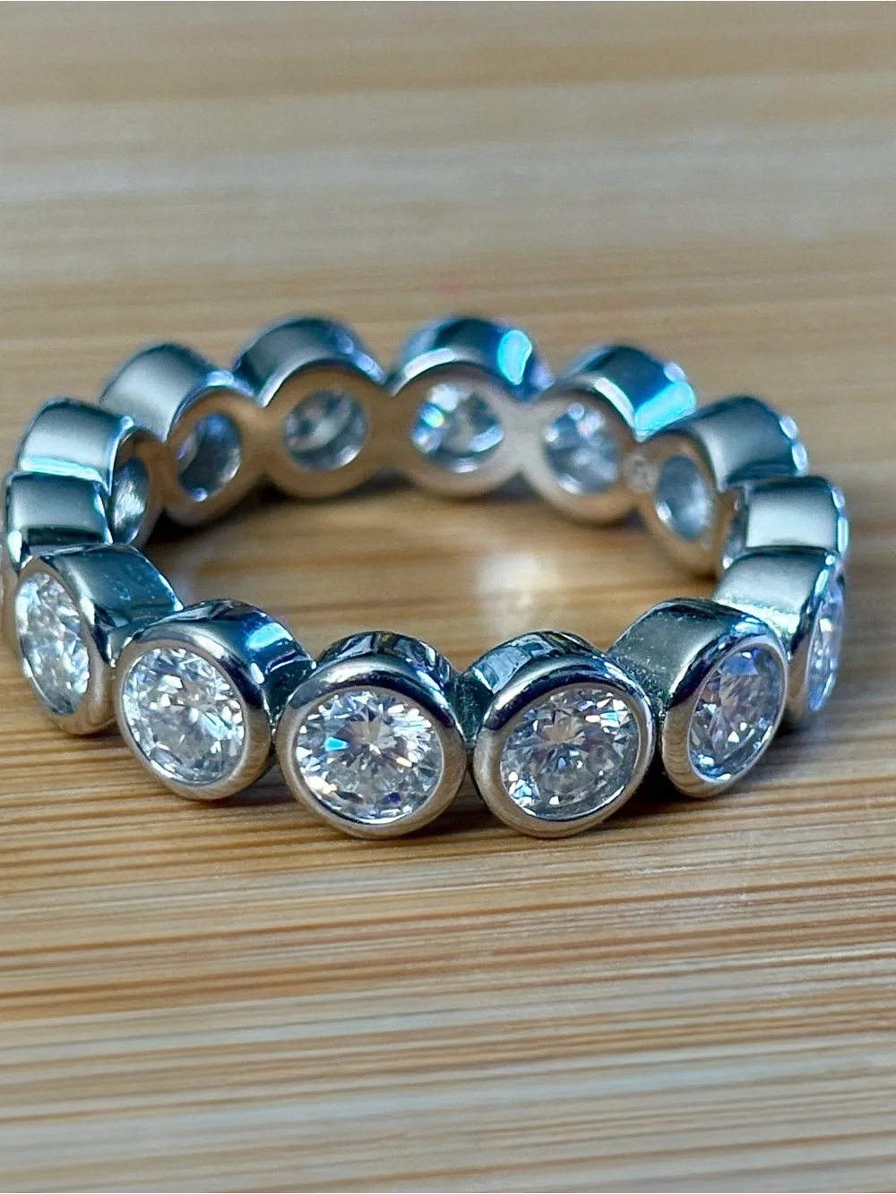 Moissanite eternity ring with .50ct stones in 935 Argentium silver! So sparkly!